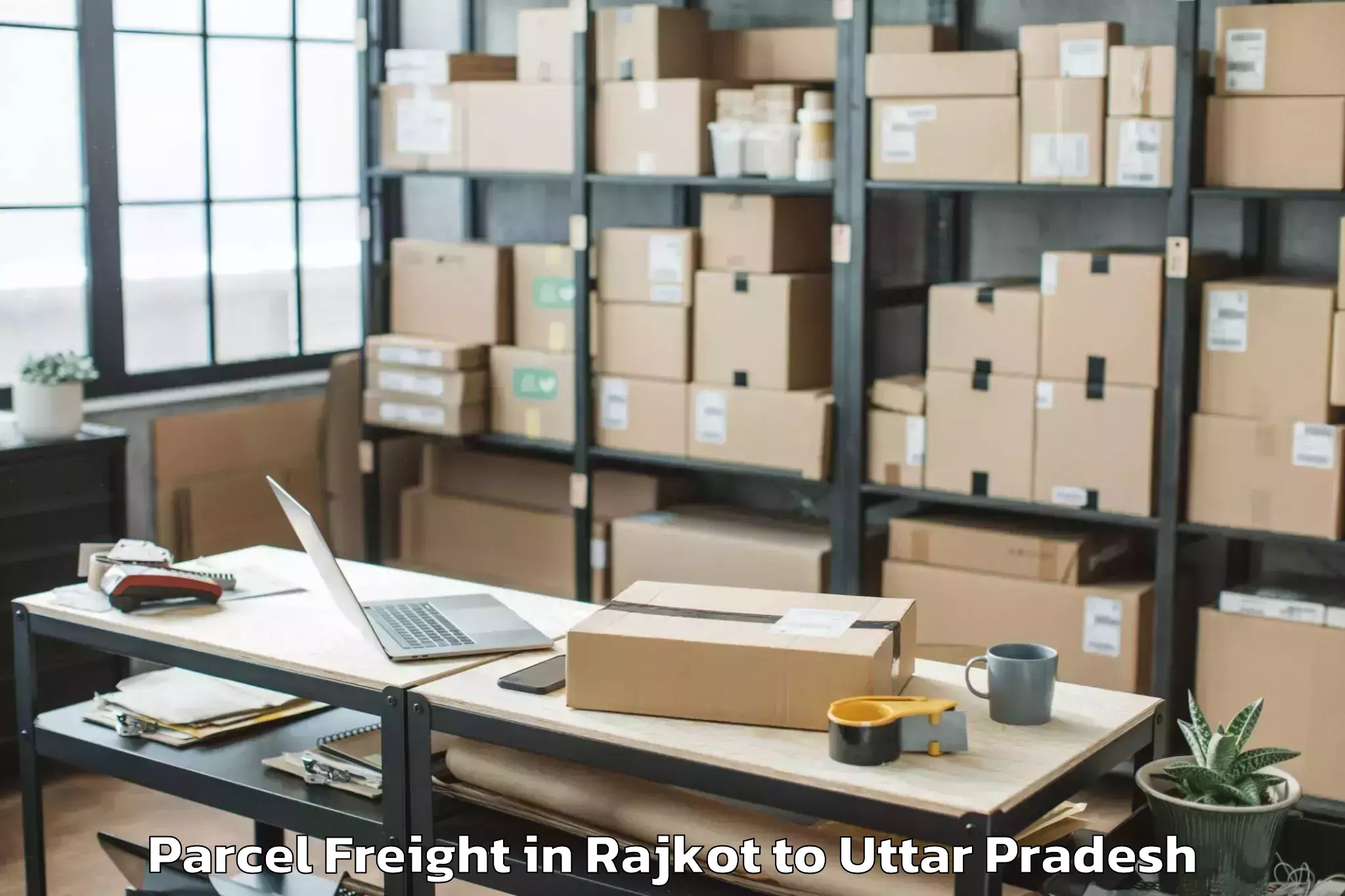 Book Rajkot to Allahganj Parcel Freight Online